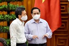 https://baochinhphu.vn/Uploaded/hatheluc/2021_05_11/TTg%20%20trao%20doi%20voi%20Pho%20TTg%20Dam%20ben%20le%20cuoc%20lam%20viec.jpg?maxwidth=300